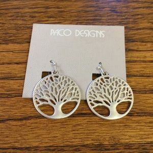 Matte silver tree of life earring.